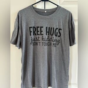 Graphic tshirt- ‘FREE HUGS- Just kidding, don’t touch me’.